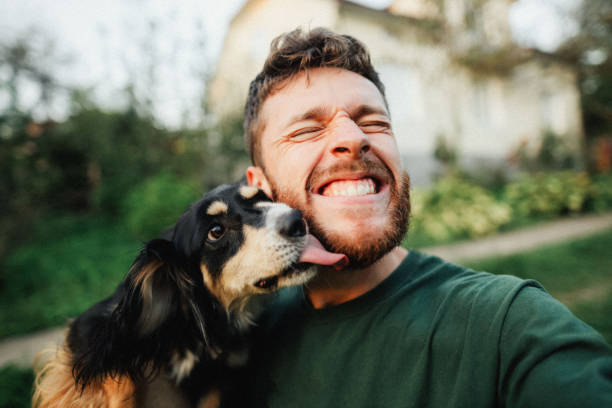 dog and owner are happy